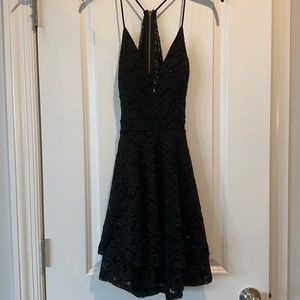 Cute short black dress, wore once for homecoming.